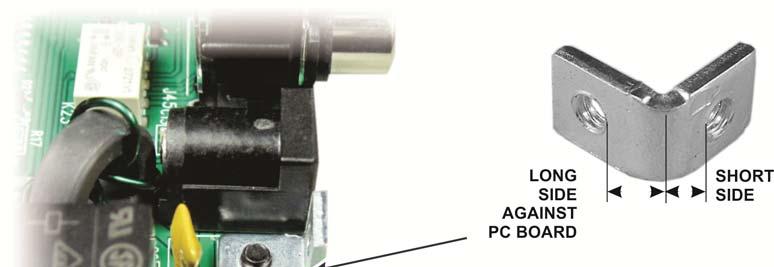 Mount the angle bracket at LB1 on the pc board as shown in Figure 9.
