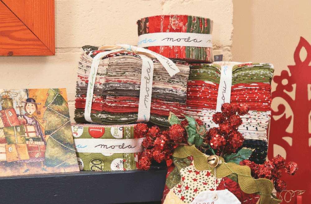 A Stitcher s Stocking Moda festive fat quarter packs and jelly rolls courtesy of PK Fabrics.
