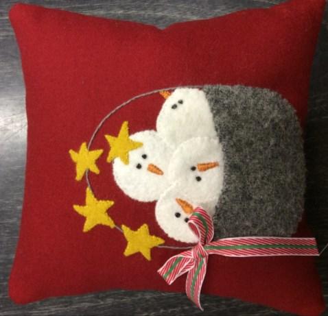 Snow Happy Wool Pillow What could be more appropriate in December than a bucket full of snowman!