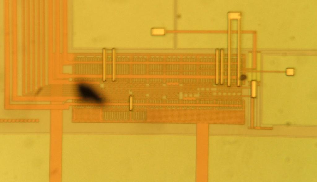 Figure 6.15: Microphotograph of the fabricated circuit in Fig. 174µm. 6.7, 396µm x Figure 6.16: Conceptual circuit of the proposed output buffer with I Q Control Circuit.