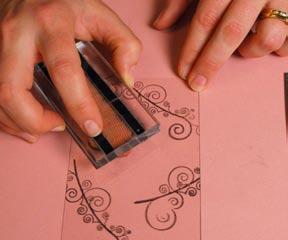 This can be done with a paper trimmer or a craft knife and ruler on a cutting mat.