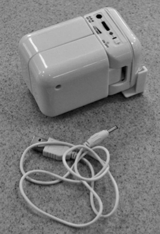 16 Fig. 1 shows an MP3 speaker unit in closed and open positions. 4 Fig.