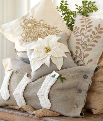 l o n m A-O Holiday Pillow Collection A. Sleigh Bell Lumbar, $49 B. Holly Branch Embroidered Lumbar, $49 C.