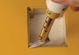 Use your Trim Seal Tool to iron the covering down around and inside