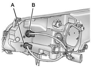 Îngrijirea autovehiculului 9-33 Ansamblul farului de nivel superior (este prezentată partea pasagerului din faţă, partea şoferului este similară) A. Lampă pentru semnalizarea direcţiei B.