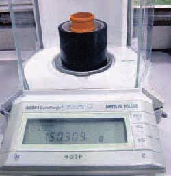 To be specific, the net weight of the cylinder is 150.325 g. The initial ink amount, e.g., 0.10 cc, is applied from the pipette to the IGT High Speed Inker.