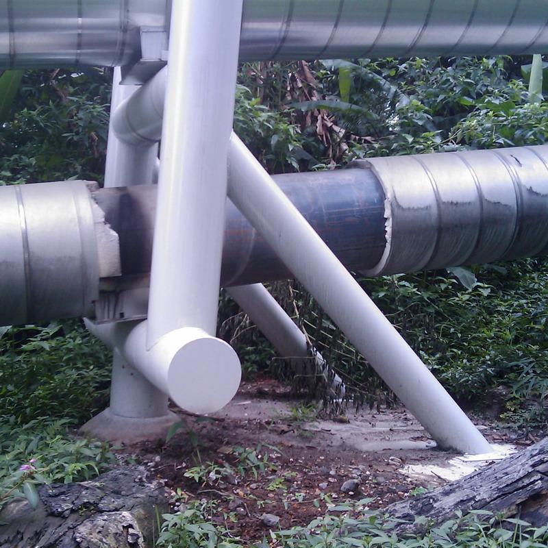 (a) (b) Fig. 6 (a) Typical insulated line, and (b) Difficult access due to elevated pipe. Elevated pipe-work also presents access difficulties, as demonstrated in Fig. 6b).