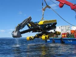 Spider Dredging System Level Seabed for Oil and Gas Exploration Application: Controlling hydraulic systems on the Nexans Spider remote operated vehicle (ROV) as it levels the seabed and clears a path