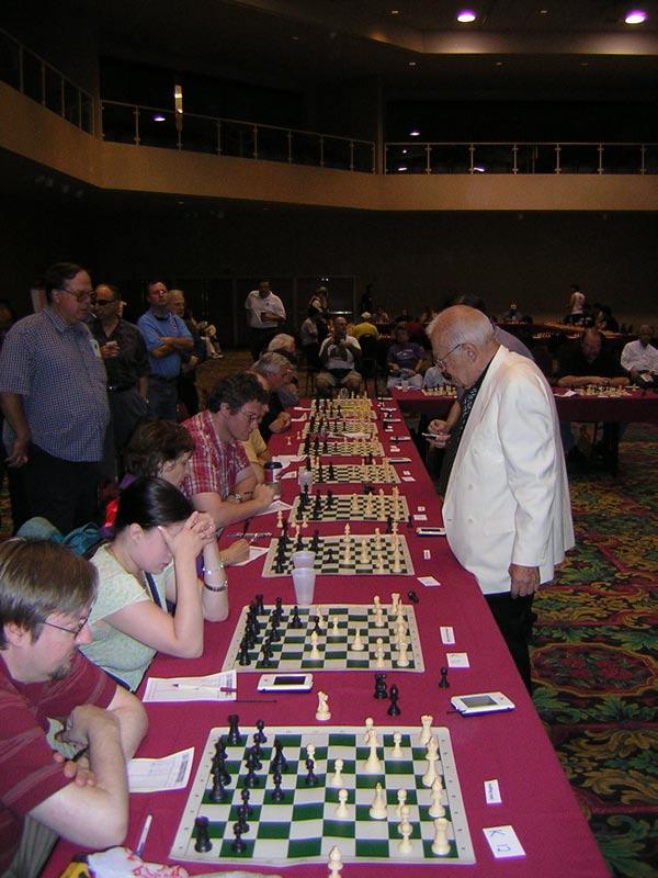 Although he did not win all the games, just having the energy to walk around the room handling the boards for over 3 ½ hours is a testament to the saying that Chess is Victor Korchnoi s Life.