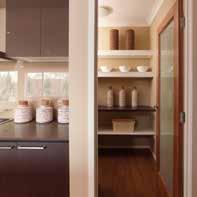 CABINETS Love the laminated cabinetry with portrait doors to overhead and underbench cupboards.