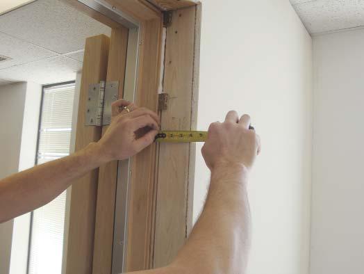 OPTIONAL EXTENSION JAMB INSTALLATION 1. A Measure distance from standard doorjamb to edge of finished wall.