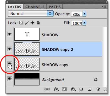 together. First, hide the original shadow layer temporarily by clicking on its layer visibility icon (the eyeball) in the Layers panel.