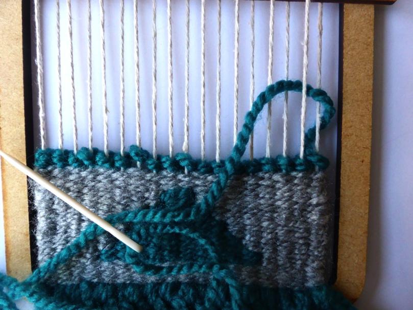 etc Once you reach the end of the first row, wrap the yarn twice