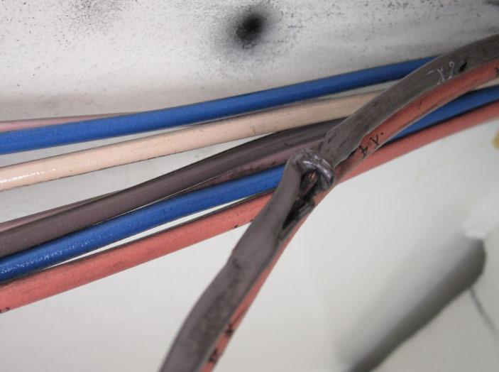 9 Evidence of arcing and insulation punctures was found in the CT secondary wiring going toward the junction box, as shown in Fig. 14.