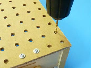perforated panel, punch 5 holes, spreading them out over the length of