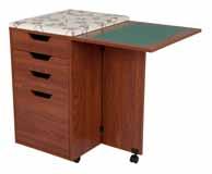 Supplied with a handy built in pressing/ ironing board. Opens up to give another work surface.