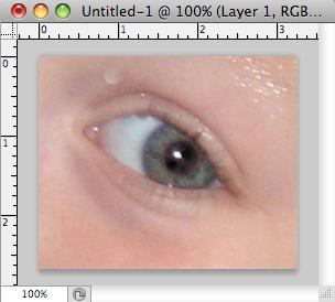 5. Click on the red part of the eye and paint, holding down the mouse button. You will see how the red will disappear (Figure 23). Hot Spot Removal Figure 23.