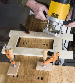 If you use a hand router, make auxiliary lines just inside the shelf knife lines.