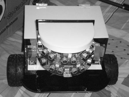 Fig. 2. ROVI: Sensor bank They are placed in a semi-circle pattern, starting with sensor 1 in the right of the robot to the sensor 9 in the left of the robot.
