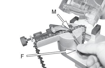 Tighten with the fastening screw (F) if nessecery. see Fig 11. 9. Position the tooth being sharpened near to the grinding disc. 10.