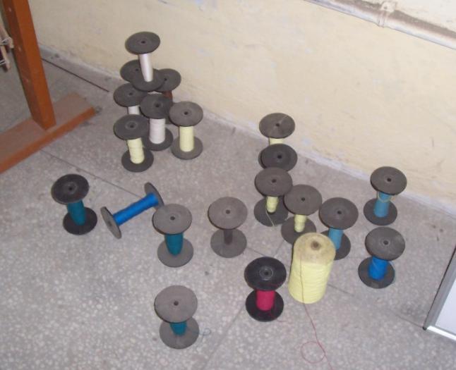 rolled, to be used on the loom for weaving. Pic: Bobbins 5.