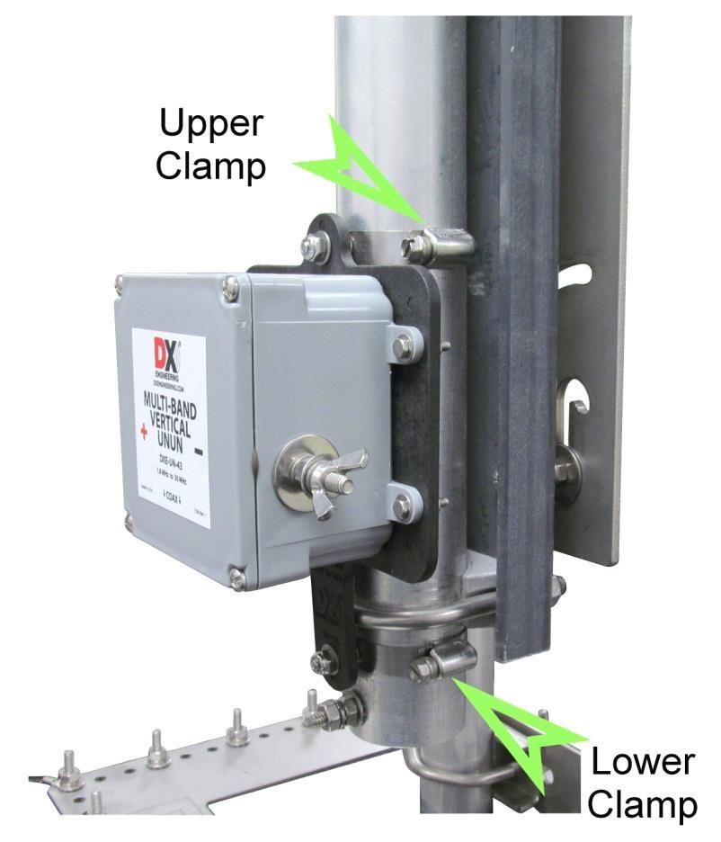 Figure 3 Position the UNUN so it faces forward as shown in Figure 4. Tighten the Upper and Lower Studded Clamps and tighten the Nyloc Nuts holding the bracket to the Upper and Lower Studded Clamps.