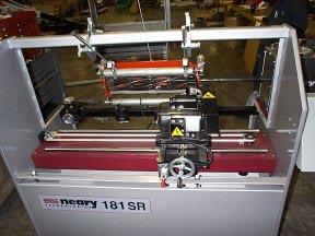 An adjustment of the various fixtures will be necessary for different types of reels. Clamp Rod Top Clamp FIG. 4 Horz.