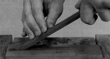 Then return to the flat bench hone. Using Water Stones and Rubber Bonded Abrasives Hold the bevel of the gouge on the hone. Roll the gouge as you pull it over the hone.
