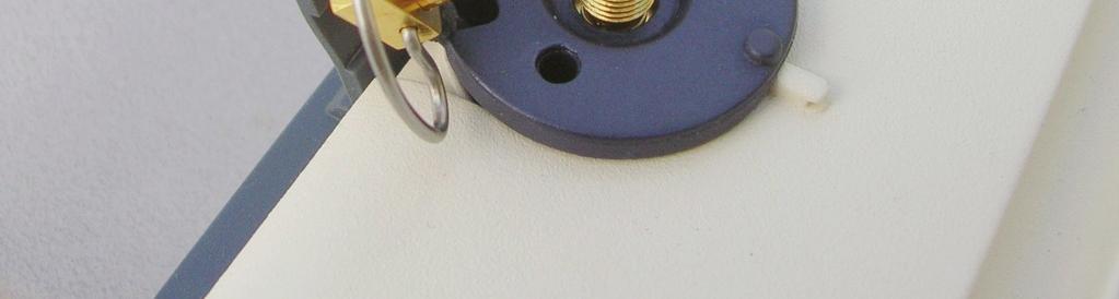 Gently push the adapter down until it is flush with the terminal housing as shown in figure 8d.