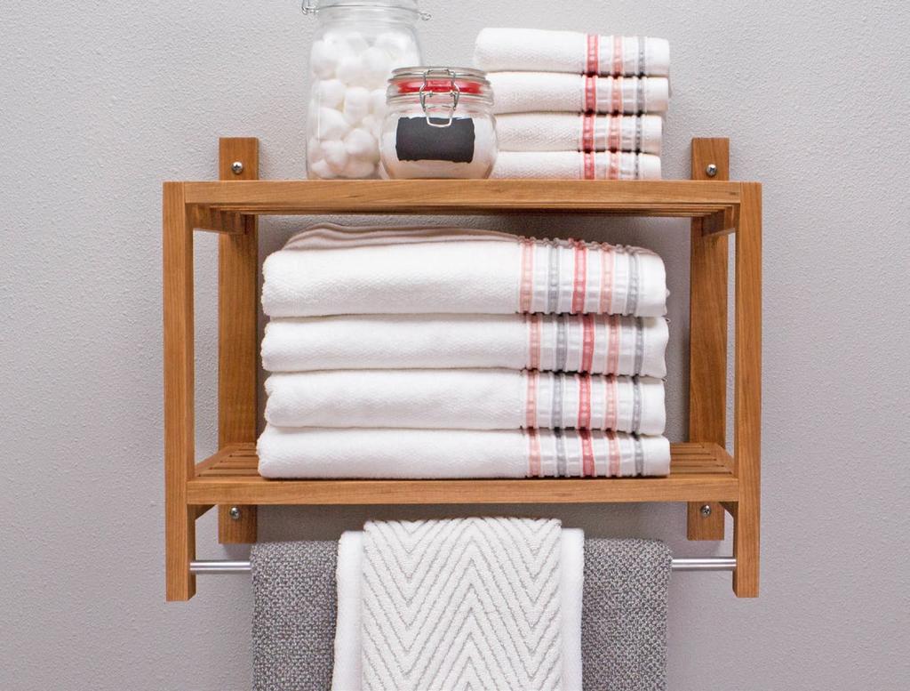 Two slatted shelves are the perfect place for folded towels and other bath accessories. Plus, the shelf has a bar for hanging towels.