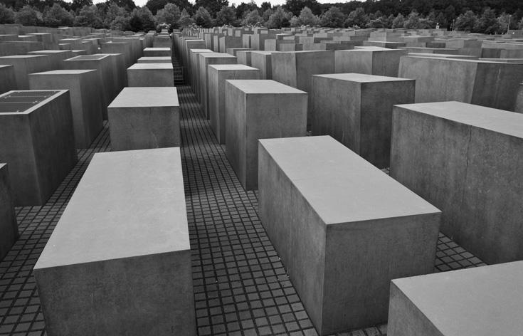 3 The Holocaust memorial in Berlin is an arrangement of cuboids. 10 (a) Tom is investigating designs made from cuboids.