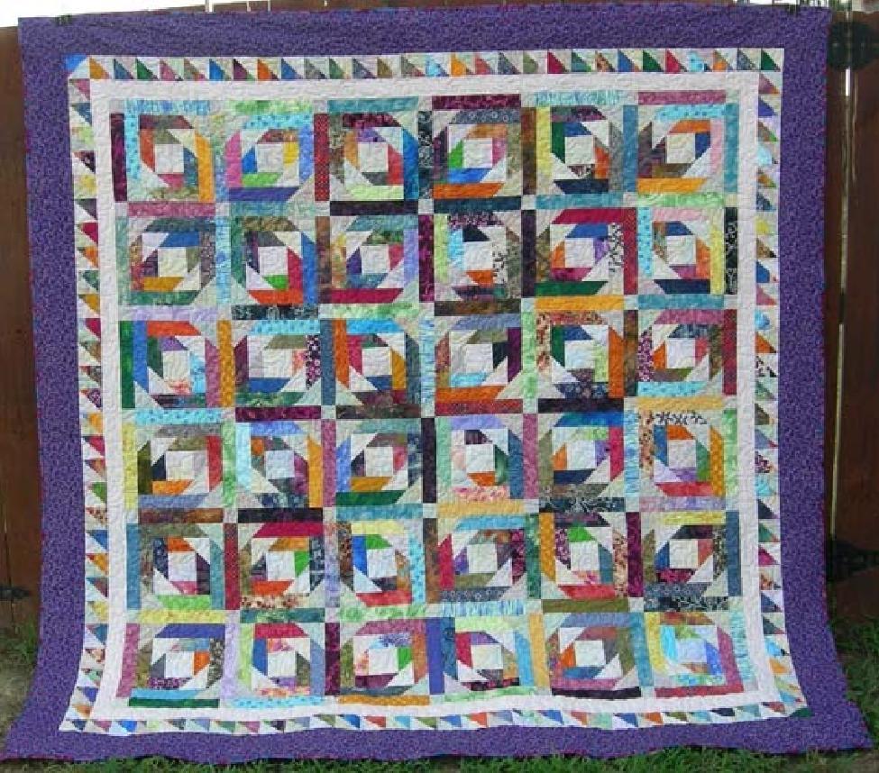 Pineapple Blossom! More fun with 2" strips and 3.5" squares! This quilt started as a pile of UFO orphan blocks!