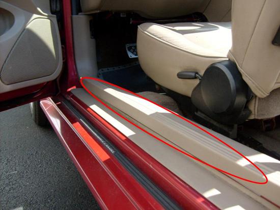 2. To start installing the door sill plates, the door sill trim cover needs to