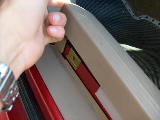 Start to remove the door sill trim by simply pulling up on one end of the trim.