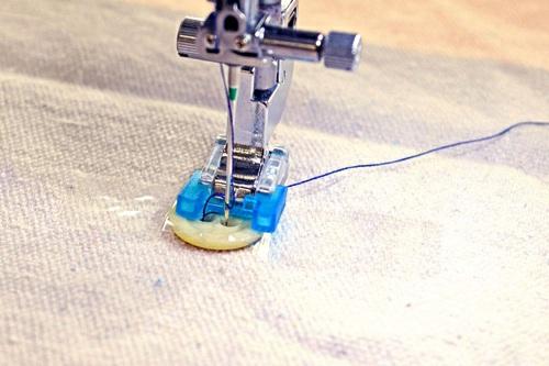 If you have lots and lots of buttons to sew in place, you may want to sew them on by machine. We have a handy tutorial on how to do just that.