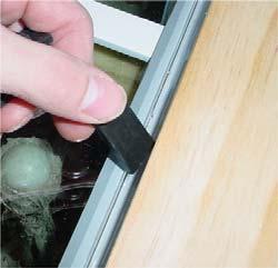 Support the inside of the glass with your opposite hand. 5) Remove existing silicone from metal glass shelf. 6) Apply ¼ bead of silicone to the metal glass shelf.