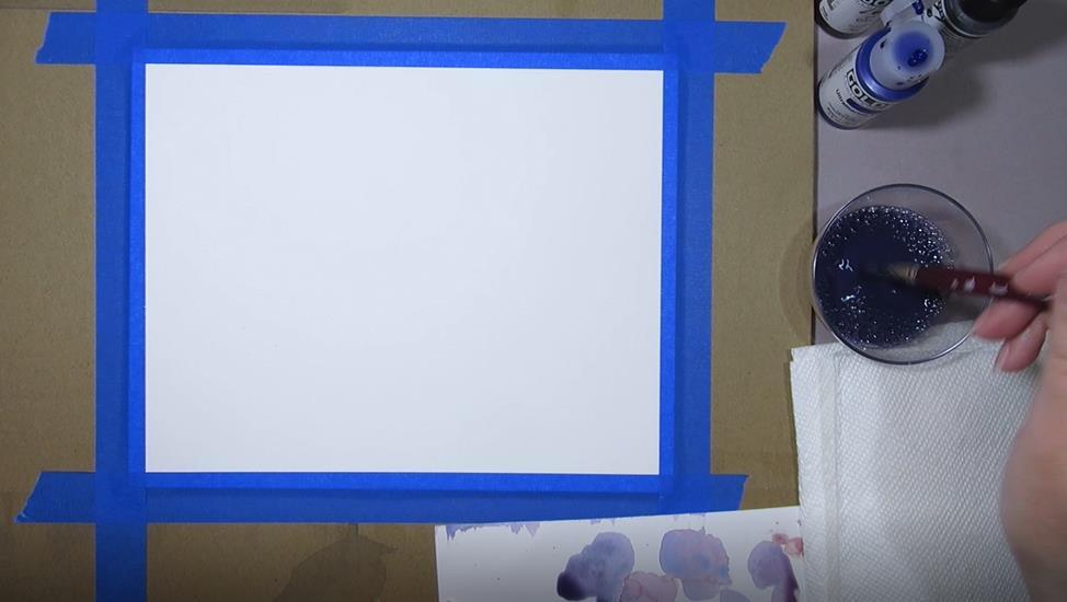 Next, I ll demonstrate how to use fluid acrylic to tone my mixed media board (or paper) with a color.