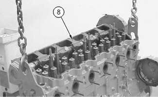 Page 4 of 8 Illustration 5 g00580812 8. Attach a suitable lifting device to cylinder head (8). Carefully position cylinder head (8) on the spacer plate.