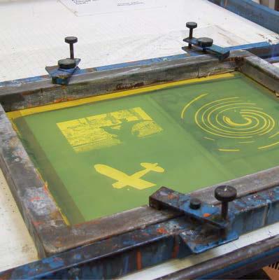 Before beginning to print with the screen, examine the stencil for holes or defects. These may be spotted in with a little of the photopolymer emulsion.