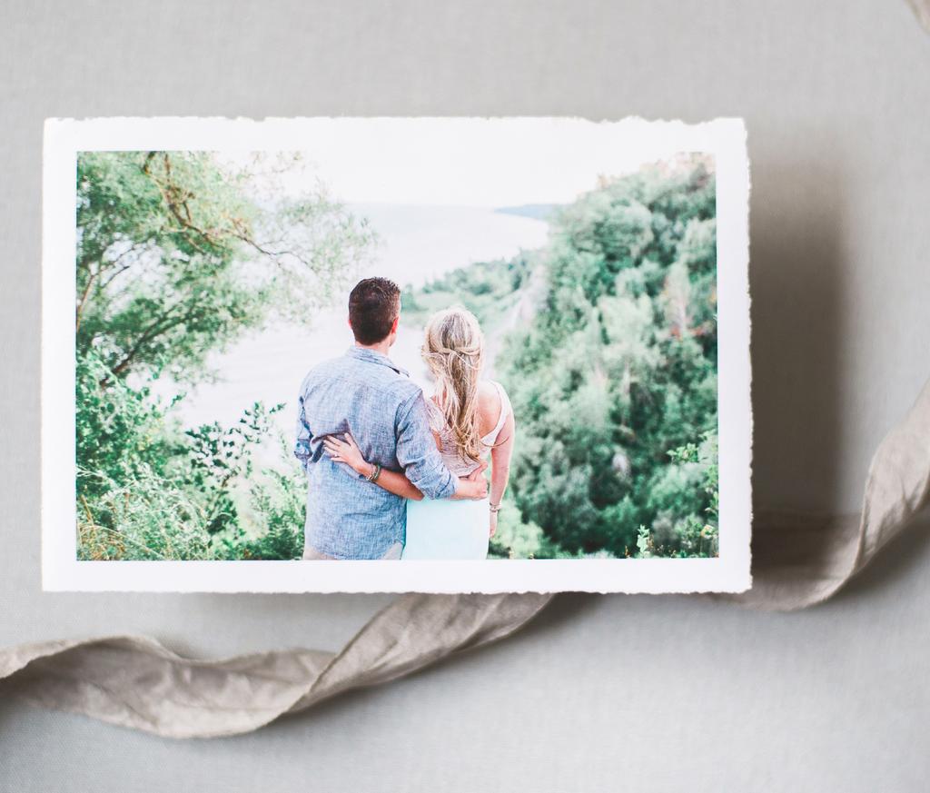 Slip sheets are placed over each image for extra protection and they are ready to deliver!