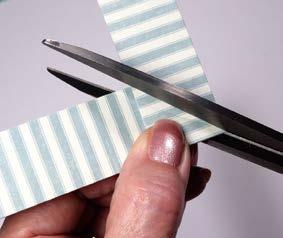 Miter the corners by placing two strips together as shown and make one clean snip