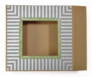 2. Lay the mixed media box flat with the side flap on the right and adhere the striped papers as