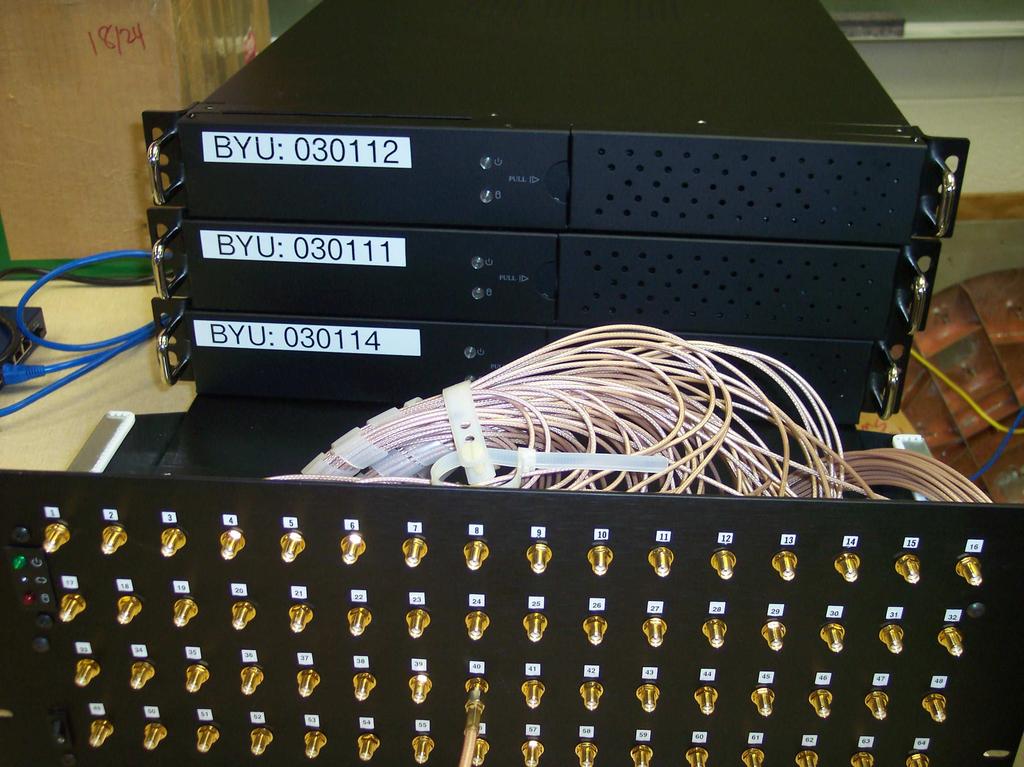 Figure 5.3: Image showing the front view of all the ROACH boards. The bottom ROACH board shows the front panel of the board having the inputs for the x64 ADC. Figure 5.