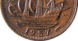 The first coins issued in 1953 had a very low relief portrait and showed very little detail, particularly in the hair area.