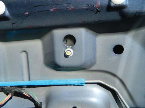 STEP 4: Once the window regulator has been put into position, tighten the window regulator attaching bolts.