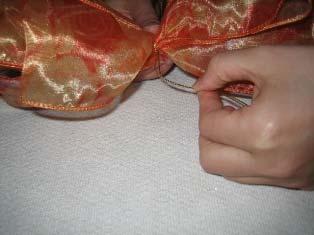 10. Gently pull the bow out of the Bowdabra.