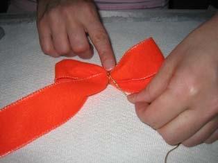 10. Gently pull the bow out of the Bowdabra.