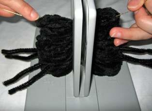 4. Continue making loops with the remaining yarn on the top of the
