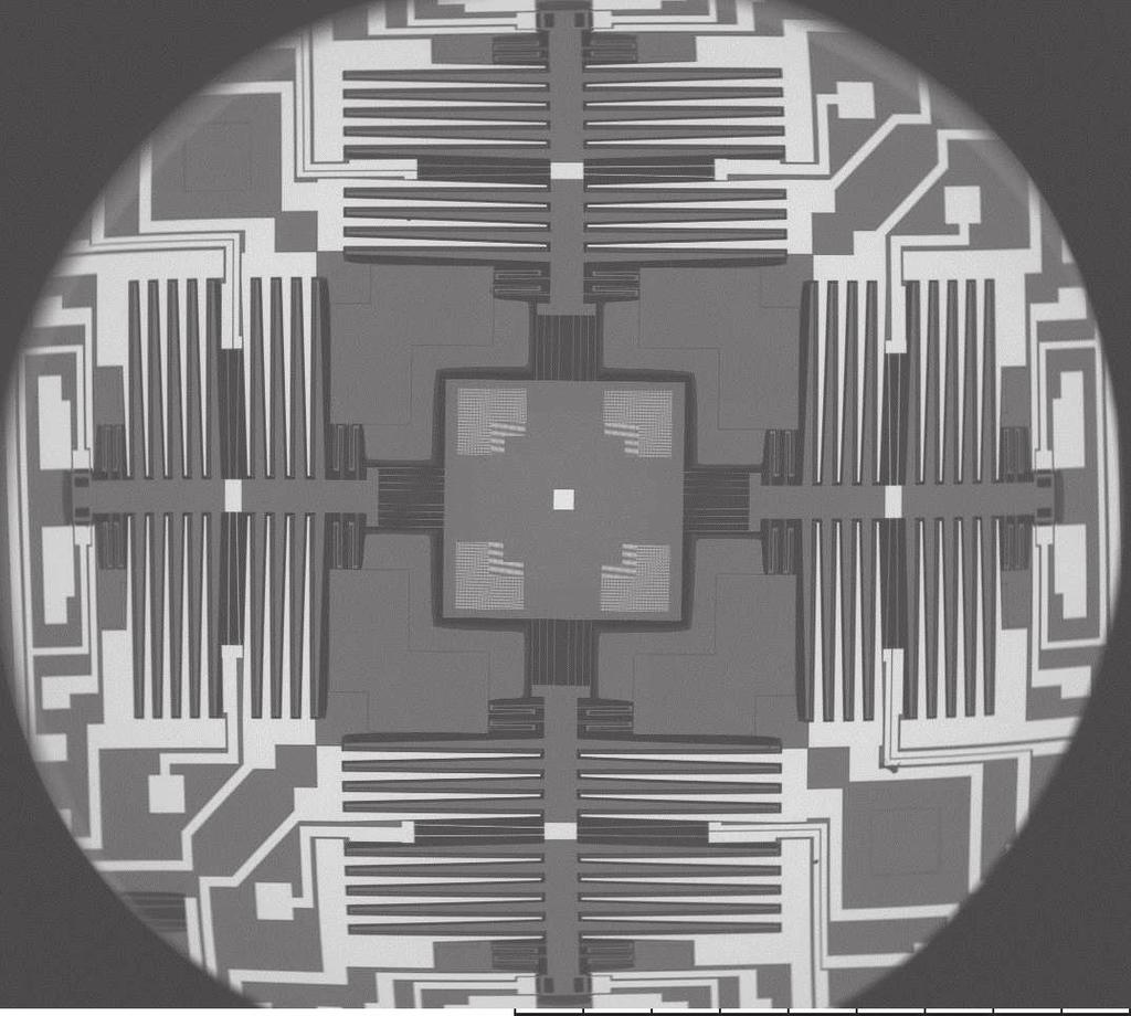 R p1 R p2 δ h V b Fig. 1: The SEM image of the MEMS nanopositioner.