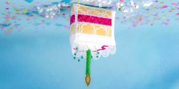 In-the-Hoop Cake Pincushion Have your cake and stitch it too with this delicious in-the-hoop machine embroidery design! Stitch each panel separately, then assemble and stuff.